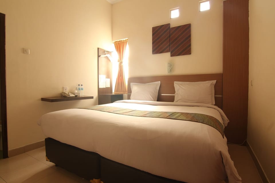 Standard Room, 1 Bedroom, Non Smoking | Free WiFi, bed sheets