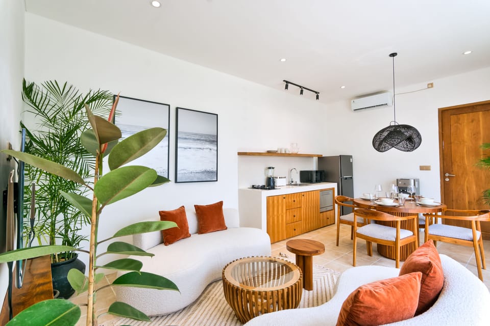 Deluxe Villa | Living area | 50-inch Smart TV with digital channels