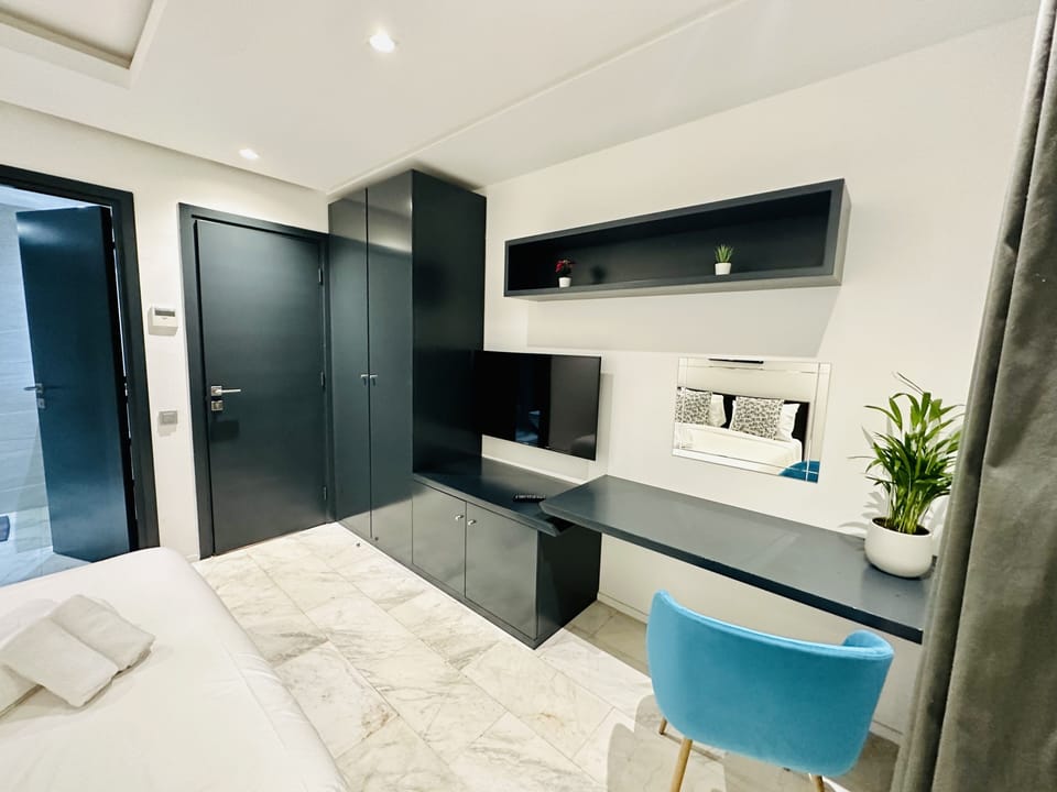 City Apartment | 1 bedroom, laptop workspace, blackout drapes, iron/ironing board
