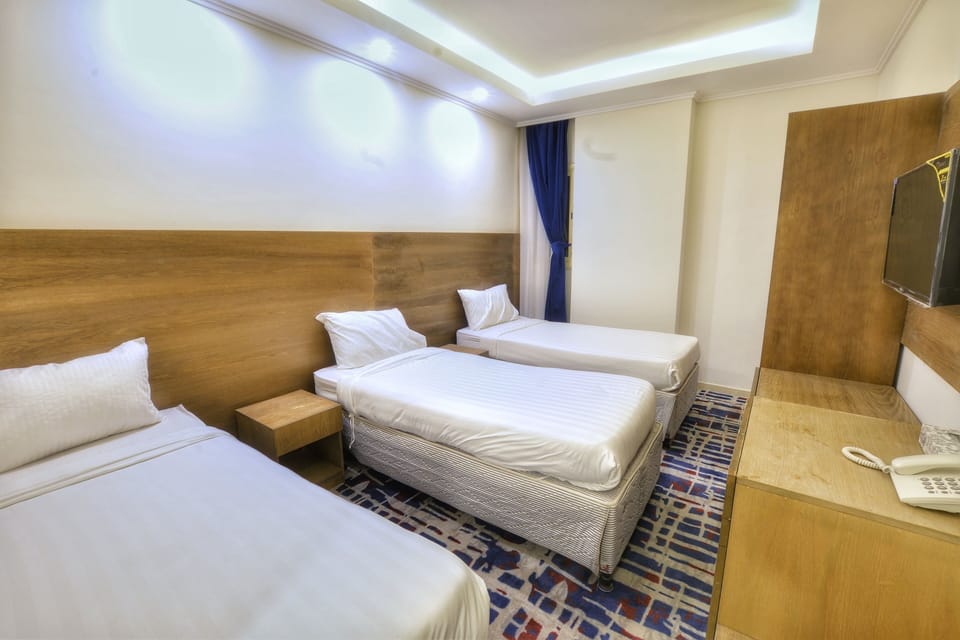 Triple Room | In-room safe, free WiFi