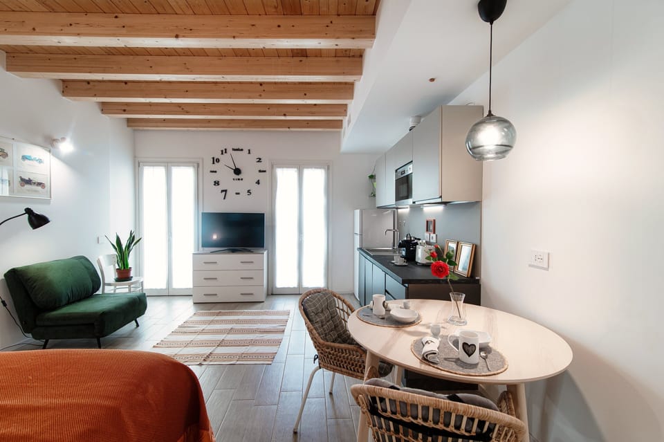 Apartment | Living area | 30-inch flat-screen TV with digital channels