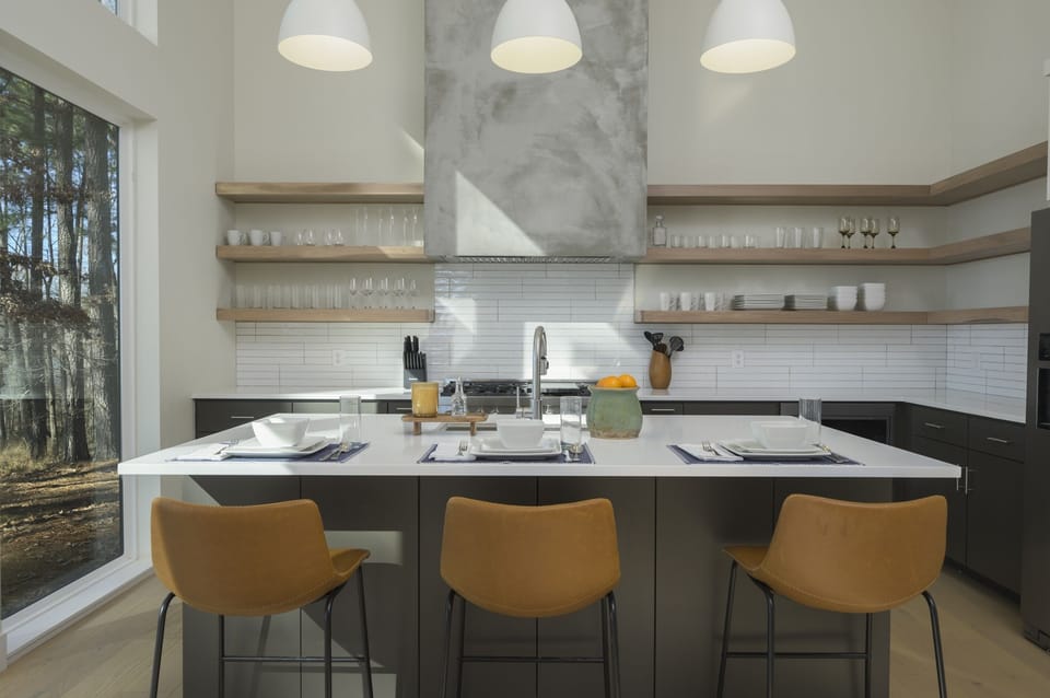 Kitchen: Sleek design meets gourmet potential in this sunlit culinary haven!