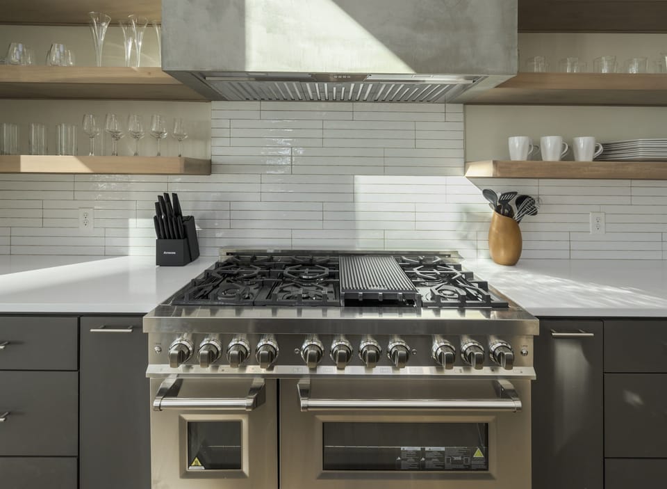 Gourmet Kitchen: Unleash your culinary creativity with a stunning range stove and stylish decor!