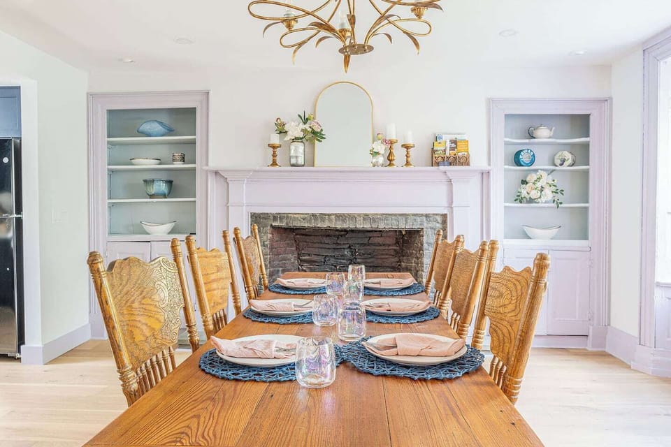 Please note that while our Dining Room is a wonderful place to gather for meals, the fireplace is purely decorative and not workable. Nonetheless, it adds a touch of charm to the room and creates a warm and inviting atmosphere.