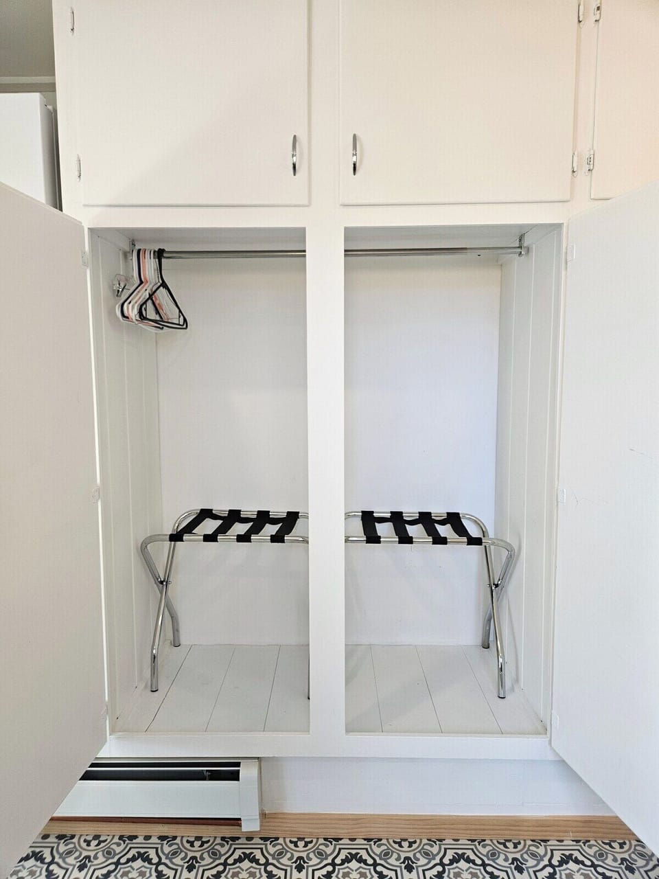 Clothes storage and luggage rack for your convenience. 