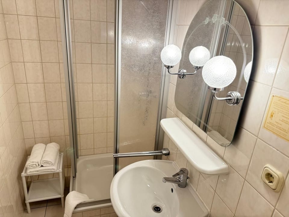 Standard Double Room | Bathroom | Shower, hair dryer, towels, soap