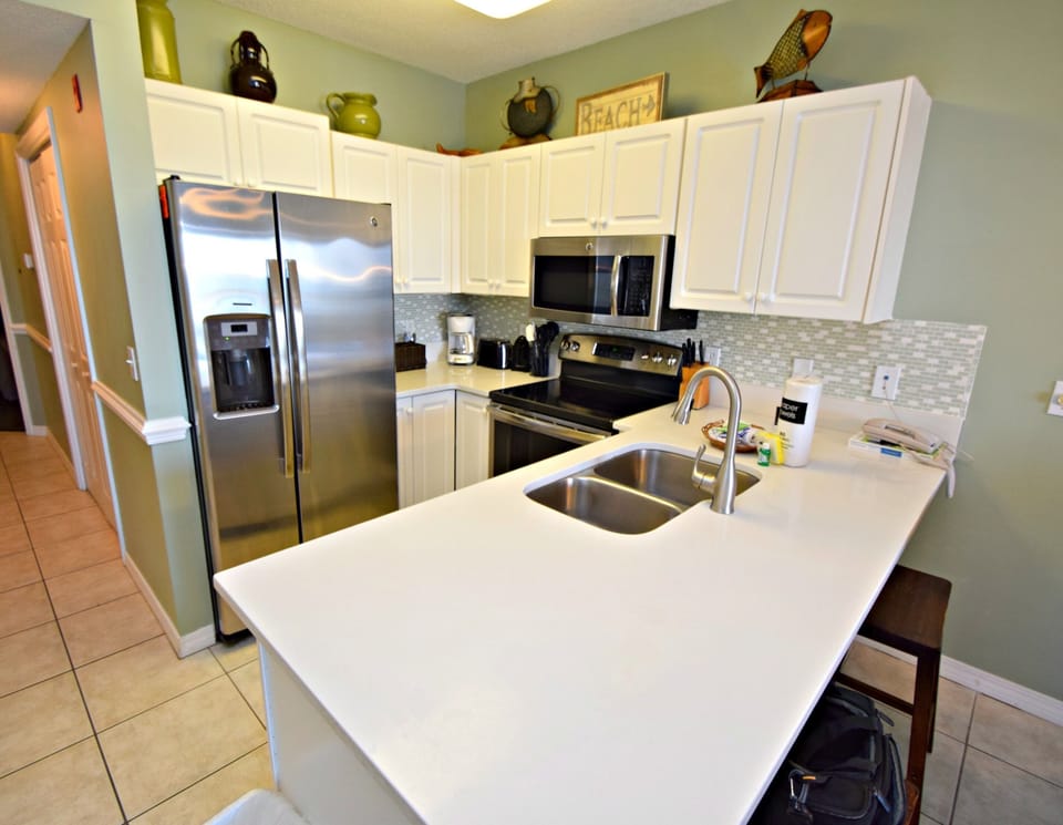 Condo, Multiple Beds, Pool Access (Caribbean 803) | Private kitchen | Coffee/tea maker