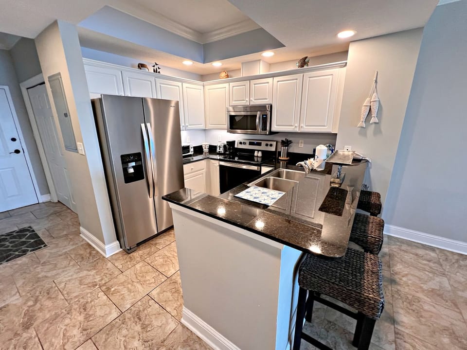 Condo, Multiple Beds, Balcony (Crystal Shores 706) | Private kitchen | Coffee/tea maker