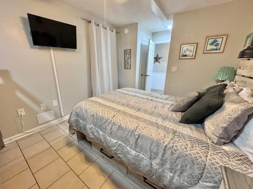 Condo, Multiple Beds, Patio, Ocean View (Island Sunrise 165) | 2 bedrooms, individually decorated, individually furnished, bed sheets