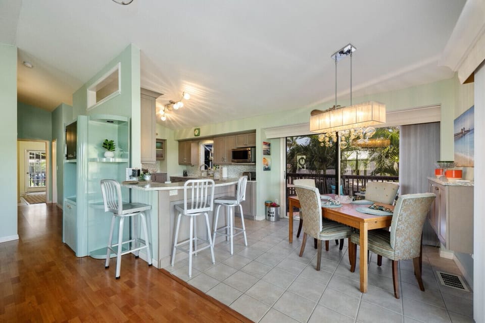 Modern kitchen island offering additional seating for casual morning meals.