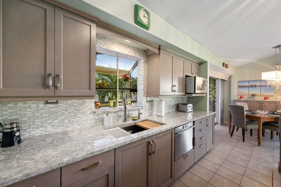 Modern kitchen workspace offering premium appliances and ample natural light.