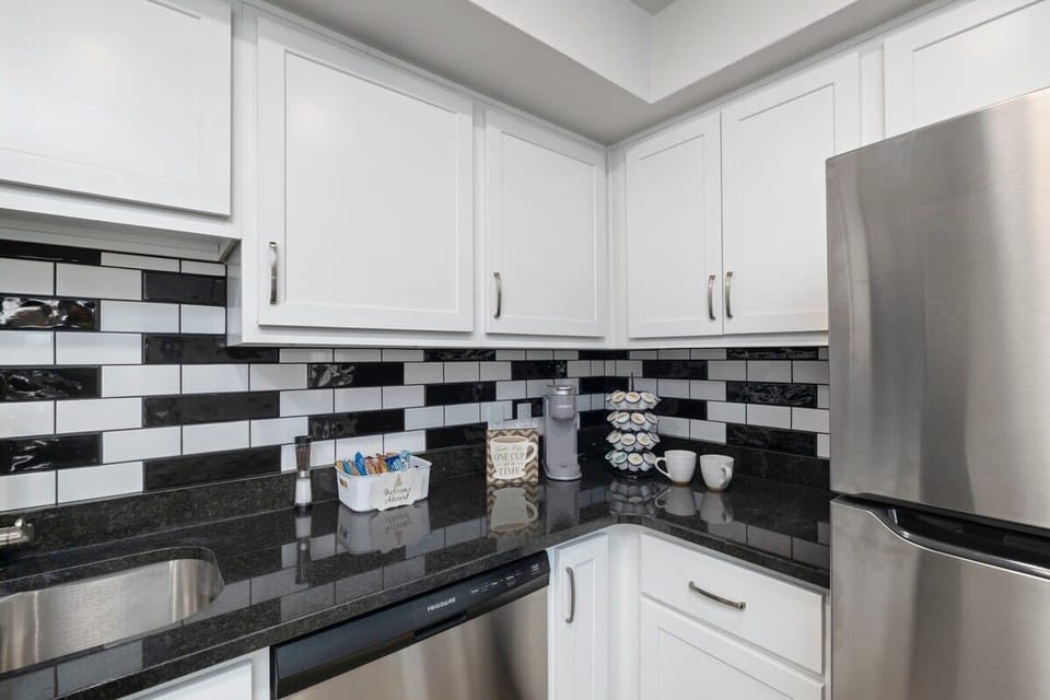 Grab your morning coffee from the coffee station with Keurig coffeemaker and coffee supplies.