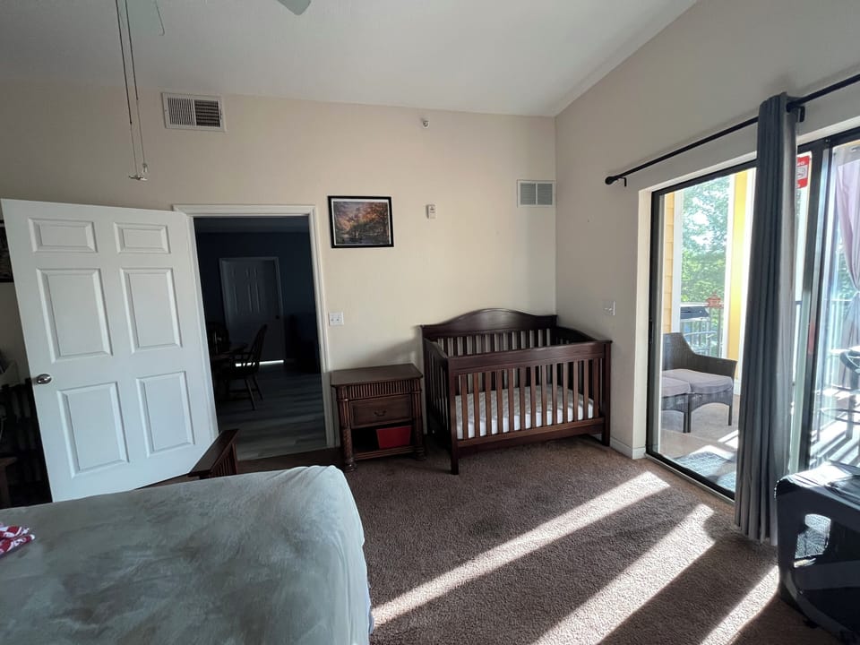 Master with full size crib