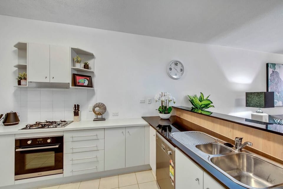 Full kitchen with breakfast bar, cooking essentials, tea and coffee.