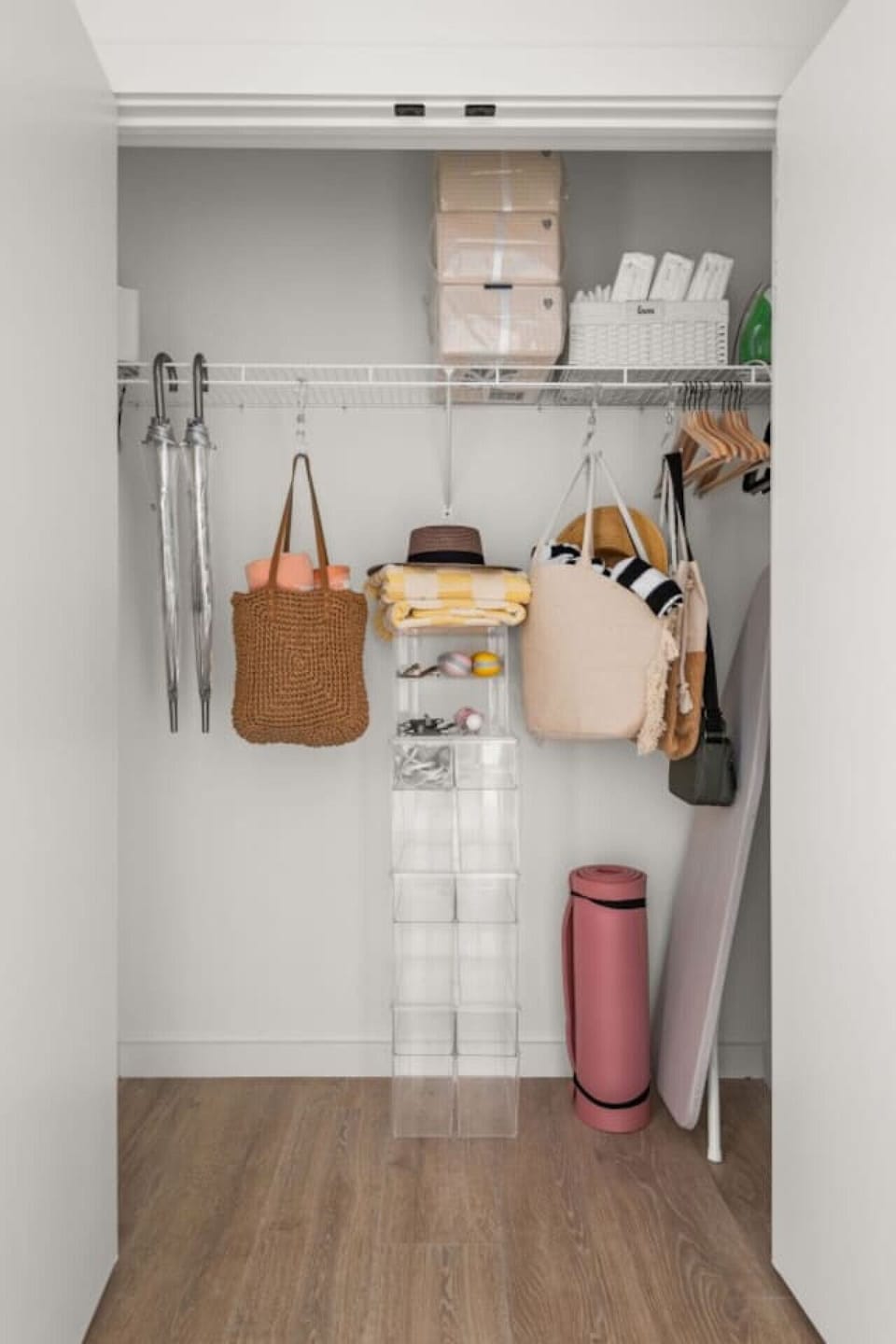 Closet with pool towels and extra storage space