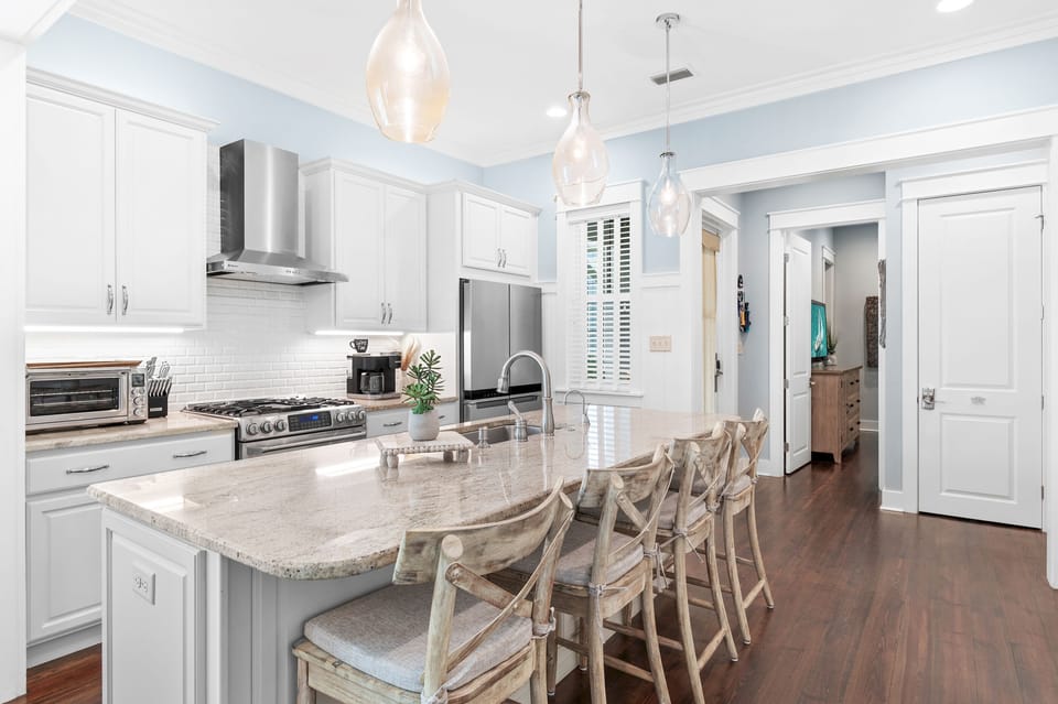 Fully equipped chef’s kitchen with ample space for group cooking, entertaining, and family meals.