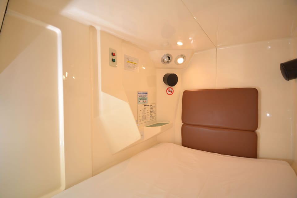 Male Shared Capsule (Tattoos not allowed) Check out by 10AM each day even if consecutive stay | Blackout drapes, free WiFi, bed sheets