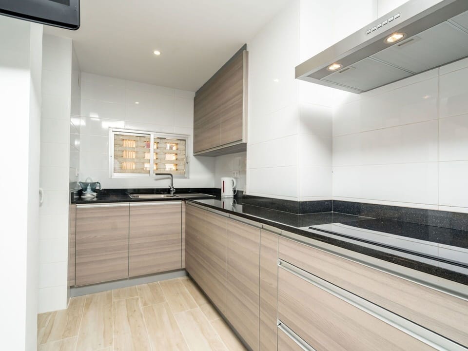 Cabinetry, Countertop, Building, Property, Furniture, Kitchen Stove, Kitchen, Tap, Wood, Kitchen Appliance