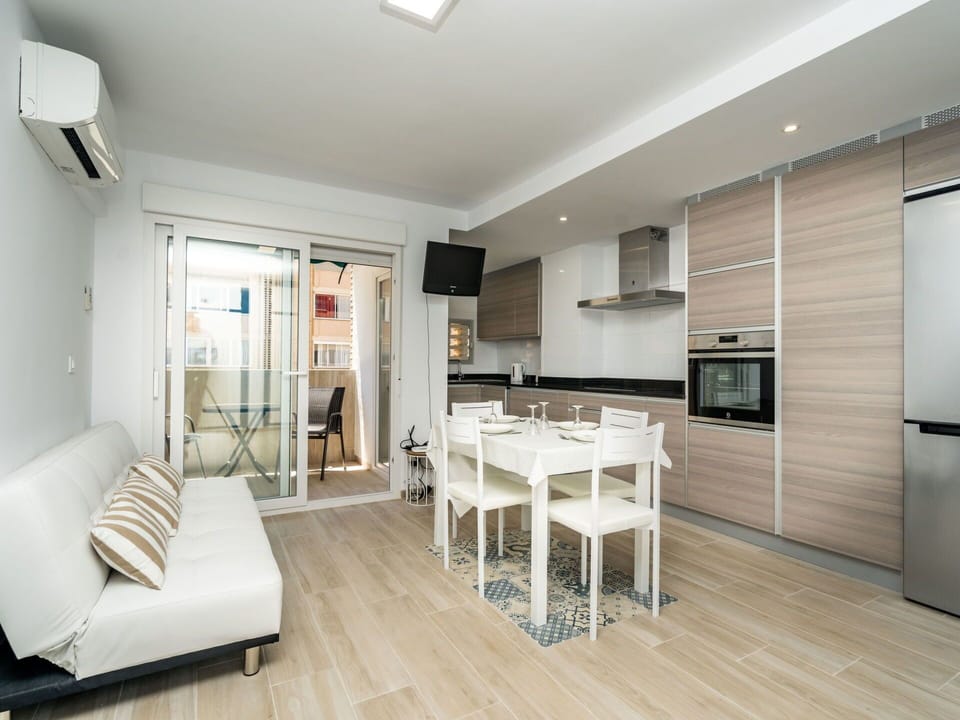 Furniture, Couch, Table, Television, Building, Comfort, Countertop, Cabinetry, Living Room, Wood