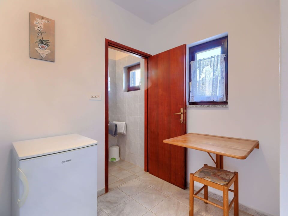 Furniture, Building, Door, House, Cabinetry, Wood, Table, Floor, Flooring