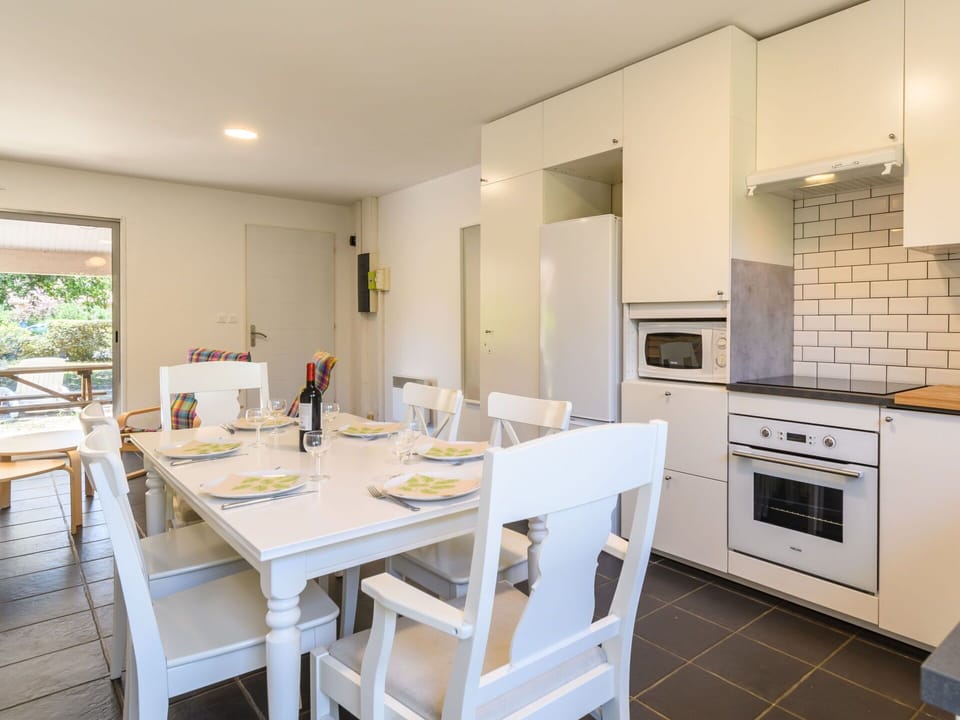 Furniture, Table, Cabinetry, Wood, Kitchen, Chair, Flooring, Floor, Window