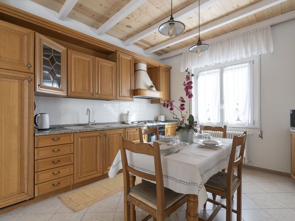 Furniture, Property, Cabinetry, Countertop, Wood, Table, Lighting, Chair, Interior Design, Kitchen