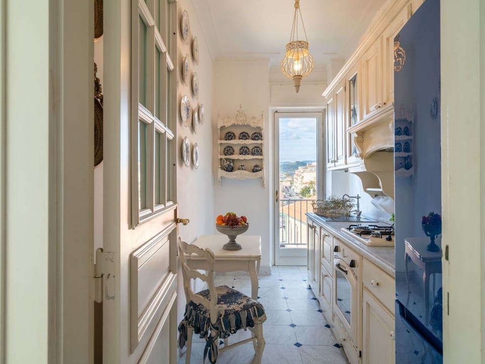 Cabinetry, Furniture, Window, Picture Frame, Drawer, Countertop, Wood, Chair, Interior Design, Houseplant
