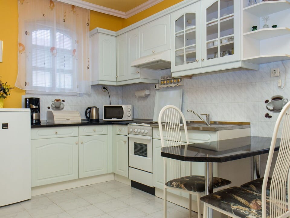 Kitchen Sink, Cabinetry, Countertop, Furniture, Sink, Kitchen Appliance, Kitchen Stove, Building, Kitchen, Window