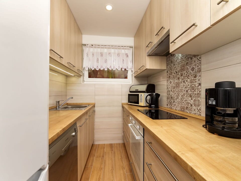 Cabinetry, Countertop, Sink, Kitchen Stove, Kitchen, Wood, Kitchen Appliance, Interior Design, Home Appliance, Drawer