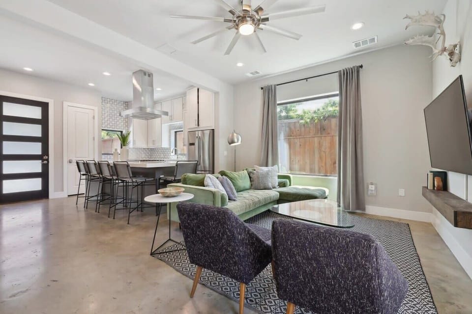 Unit A | Open Concept Living Room | XL Flat Screen TV | First Floor | Central Common Area
