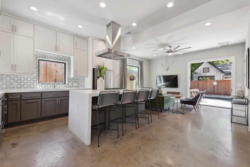 Unit A | Open Concept Chef's  Kitchen | First Floor | Fully Equipped | Gas Range | Bar Seating
