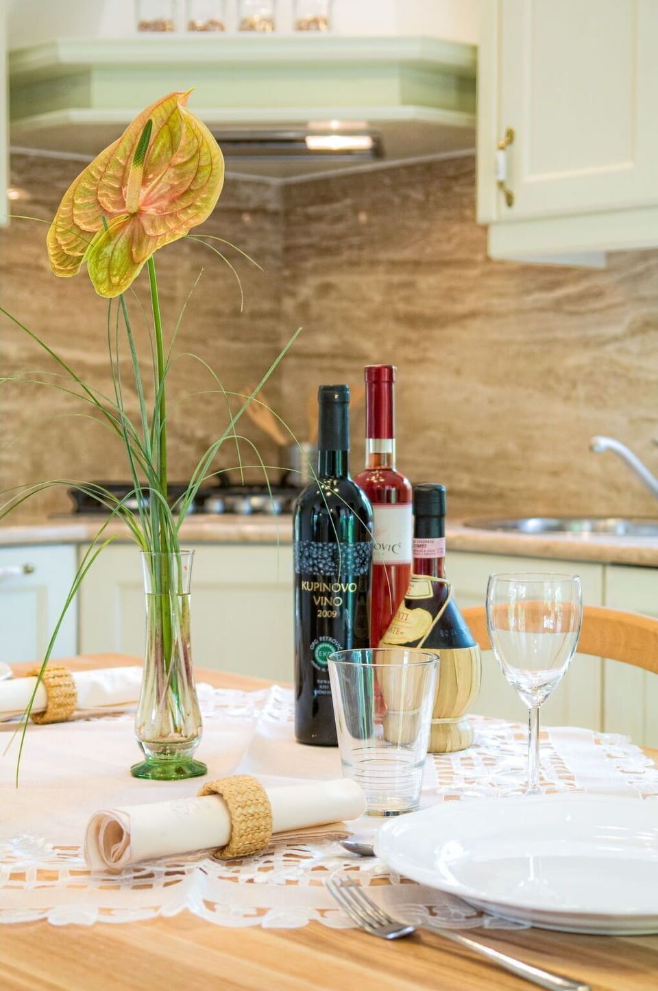 Bottle, Table, Drinkware, Flower, Tableware, Stemware, Wood, Barware, Plant, Interior Design