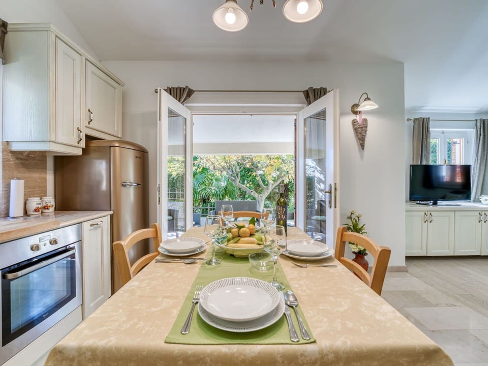 Interior Design, Furniture, Flooring, Ceiling, Wood, Countertop, Kitchen, Kitchen & Dining Room Table, Floor, Room