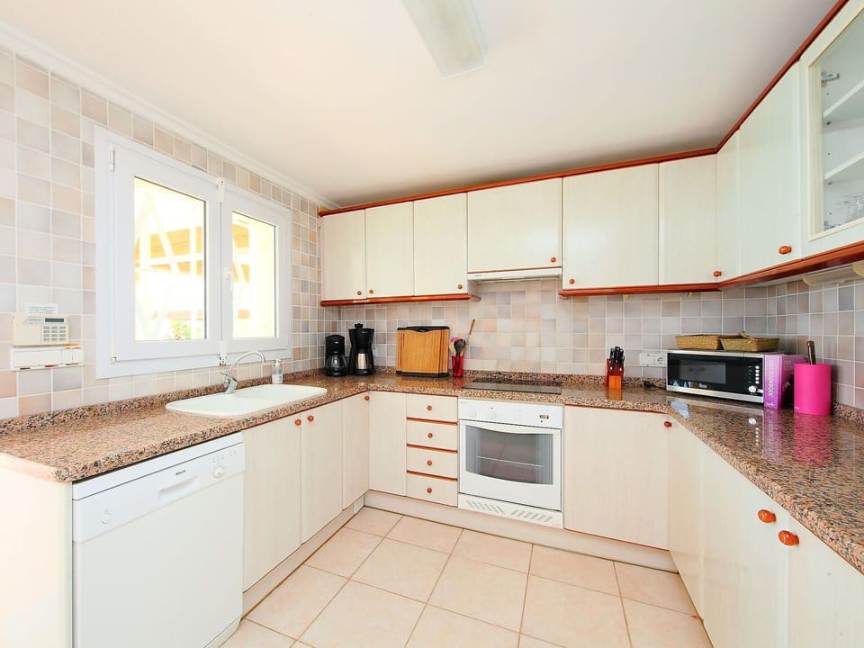 Property, Room, Kitchen, Cabinetry, Furniture, Building, Real Estate, Interior Design, Yellow, House