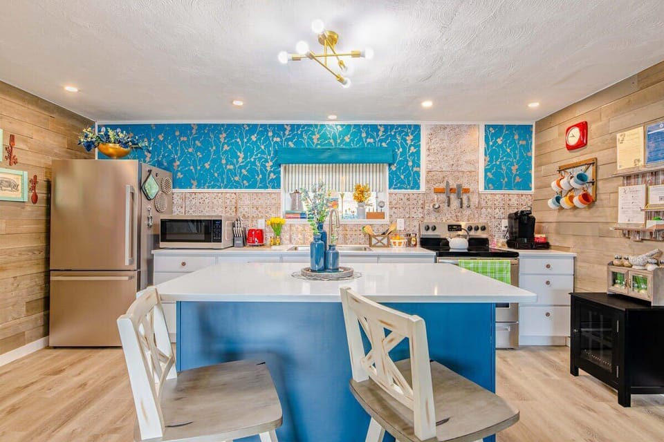 [Kitchen, Downstairs] A fully equipped kitchen to meet all your dining desires.