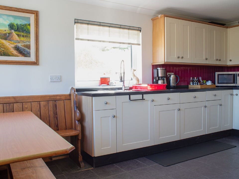 Cabinetry, Countertop, Property, Furniture, Building, Window, Drawer, Picture Frame, Interior Design, Chair