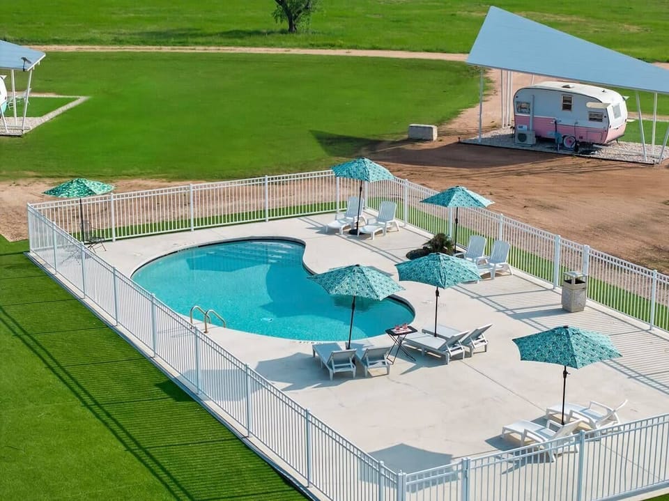 Relax by the outdoor swimming pool