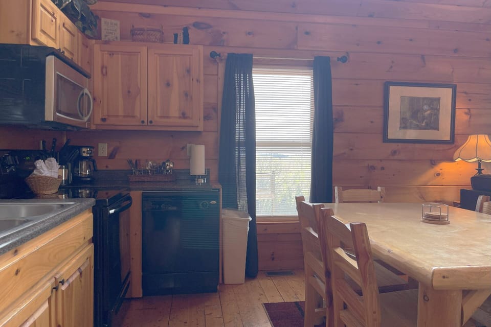 The cozy kitchen boasts all your major appliances and all your kitchen basics for preparing a meal.