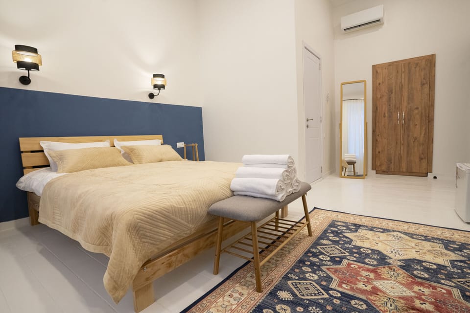 Deluxe Double Room, 1 King Bed | In-room safe, iron/ironing board, free WiFi, bed sheets