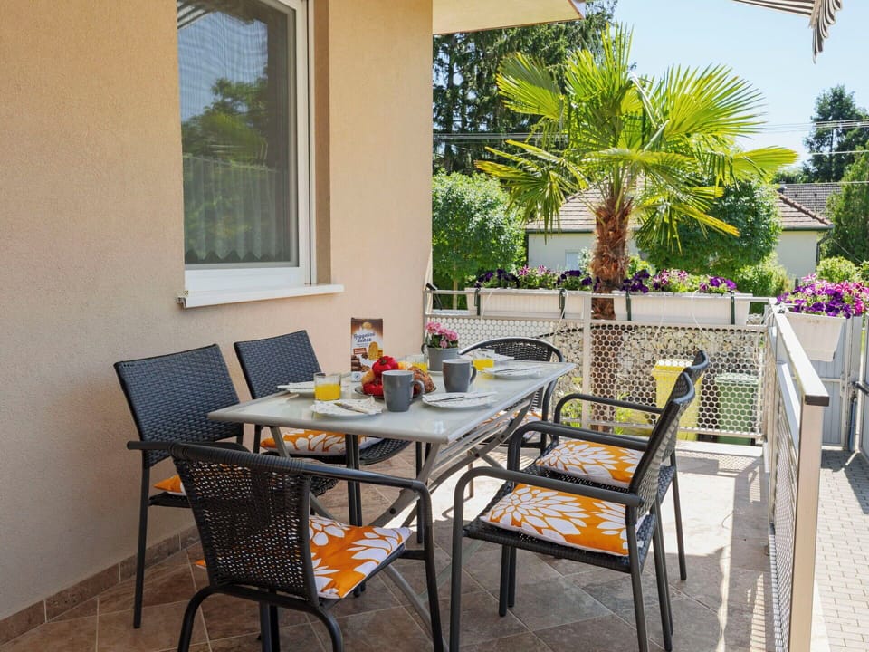 Furniture, Chair, Outdoor Furniture, Table, Outdoor Table, Interior Design, Kitchen & Dining Room Table, Patio, Shade, Garden