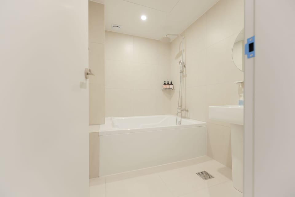 Twin Room | Bathroom | Slippers, towels