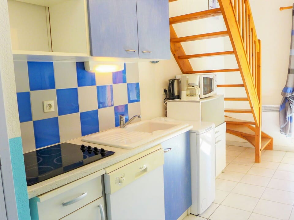 Cabinetry, Furniture, Property, Blue, Countertop, Interior Design, Building, Wood, Floor, Drawer