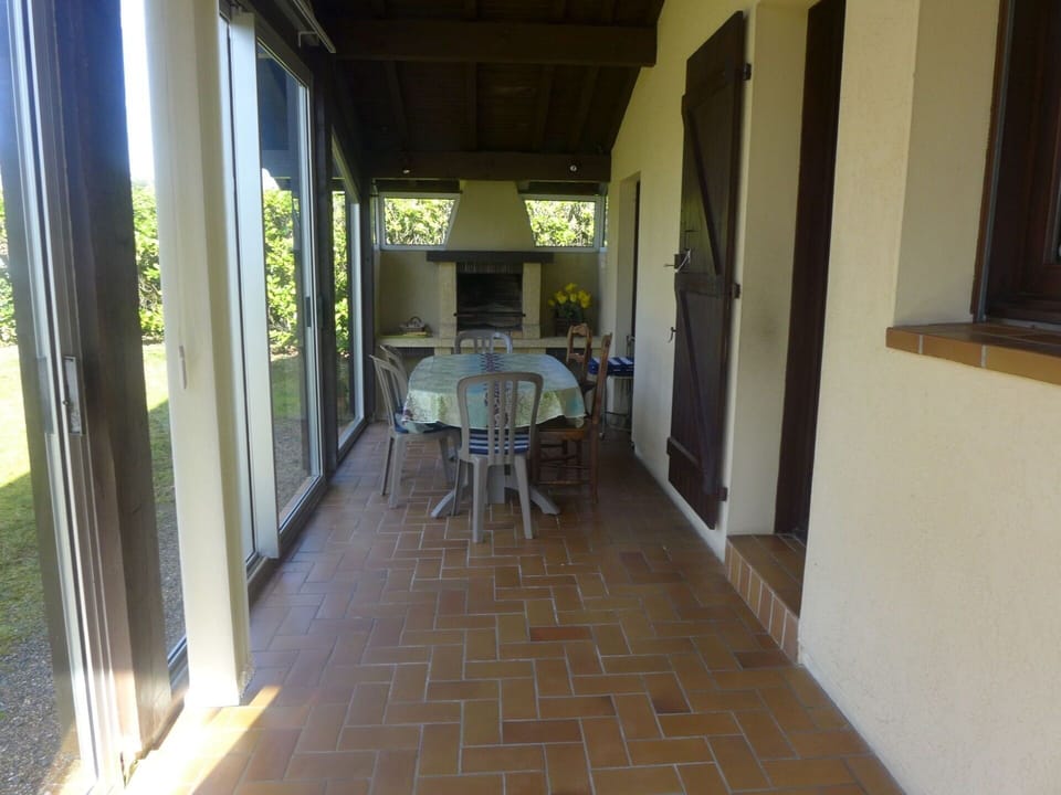 Furniture, Chair, Table, Interior Design, Wood, Hall, Flooring, Building, Floor