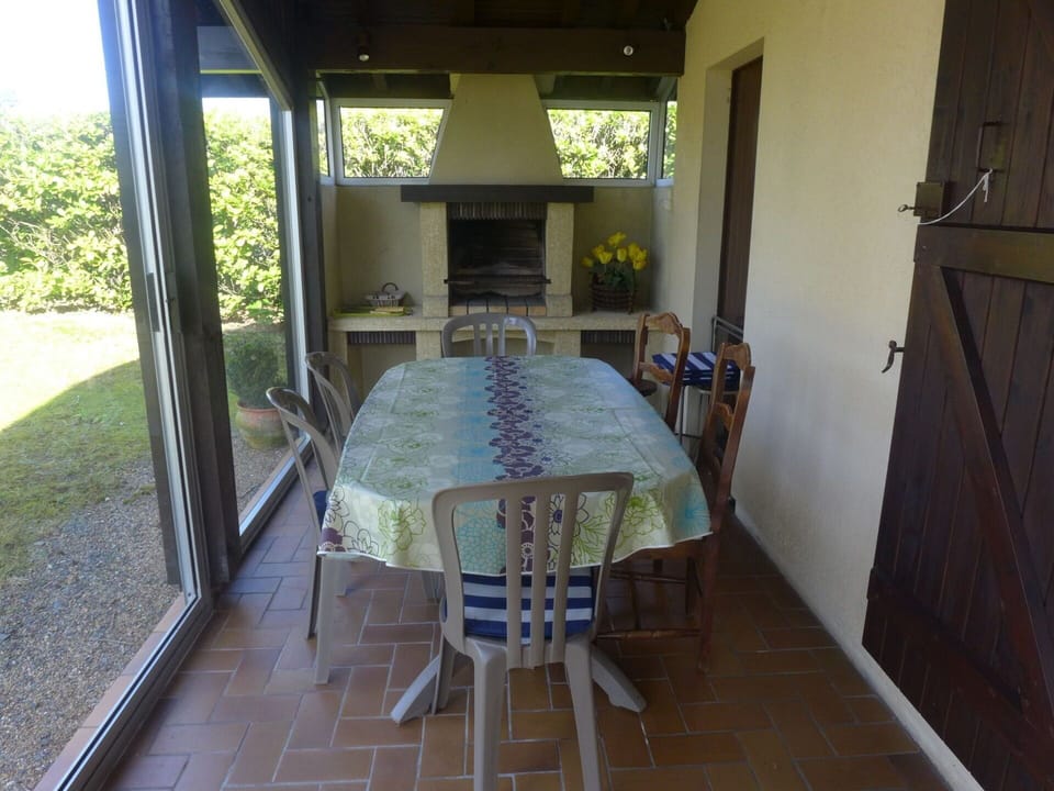 Furniture, Property, Table, Plant, Chair, Door, Interior Design, Shade, Wood, Floor