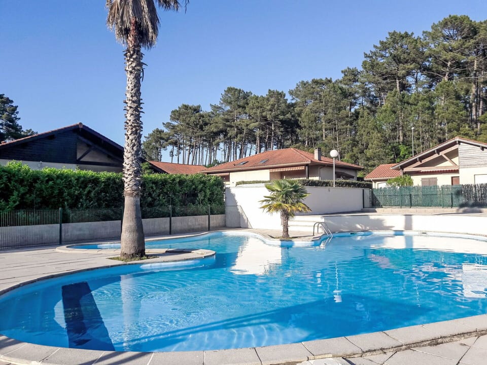 Water, Plant, Sky, Property, Swimming Pool, Building, Azure, Shade, Tree, Outdoor Furniture