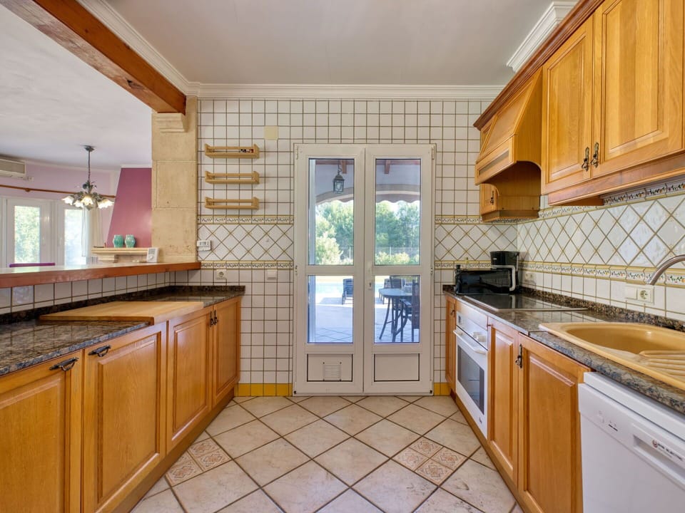 Countertop, Cabinetry, Property, Furniture, Sink, Kitchen Stove, Kitchen, Kitchen Sink, Kitchen Appliance, Wood
