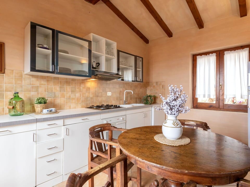 Furniture, Interior Design, Flooring, Kitchen, Countertop, Wood, Cabinetry, Floor, Home, Table