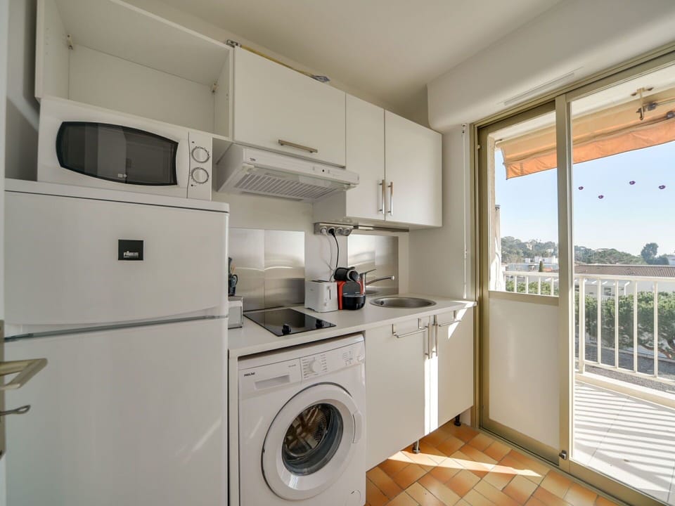 Laundry Room, Cabinetry, Property, Washing Machine, Clothes Dryer, Kitchen Appliance, Countertop, Kitchen Stove, Home Appliance, Laundry