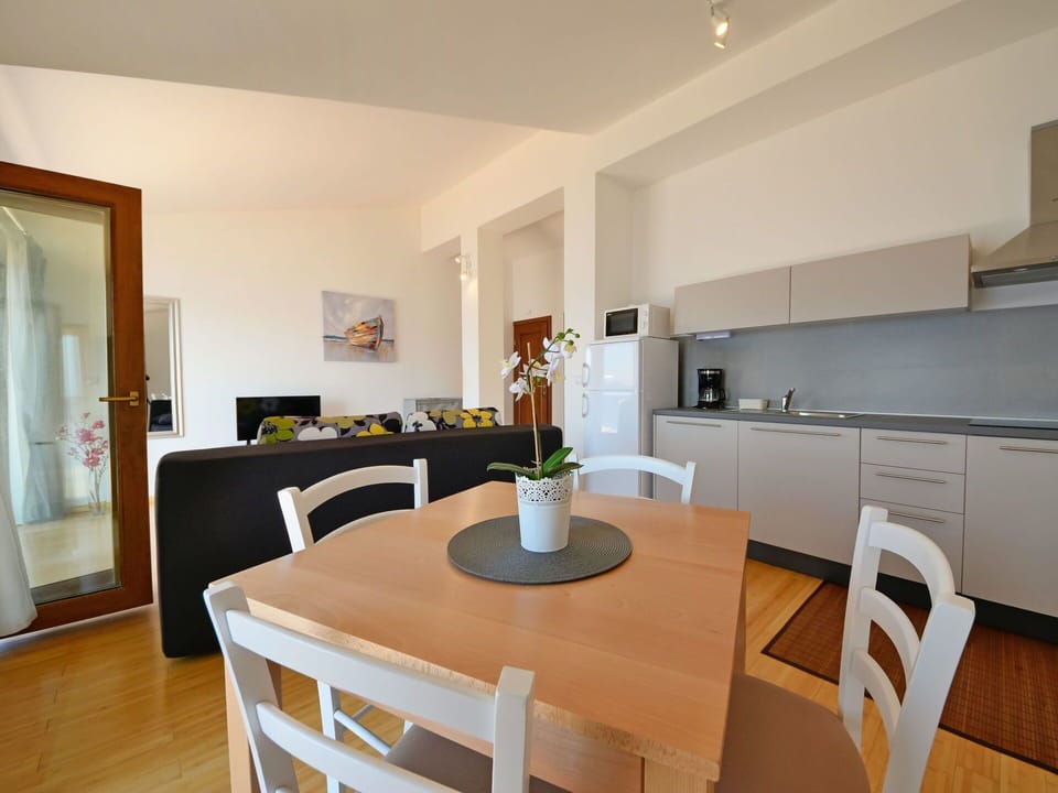 Furniture, Property, Cabinetry, Countertop, Wood, Chair, Table, Interior Design, Flooring, Home Appliance