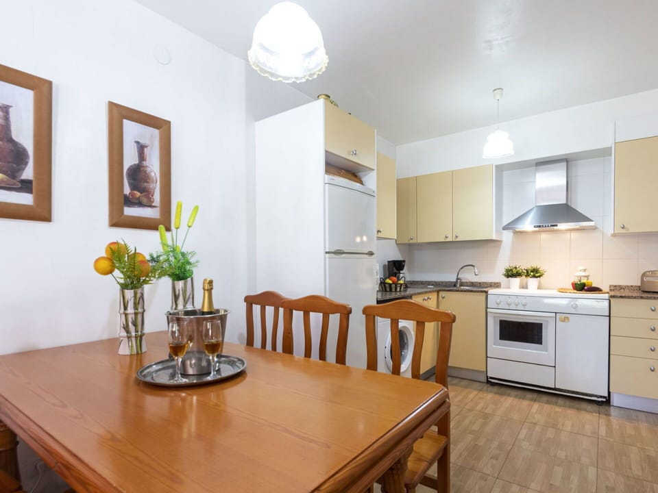 Table, Furniture, Cabinetry, Property, Picture Frame, Plant, Flower, Kitchen Appliance, Countertop, Kitchen Stove